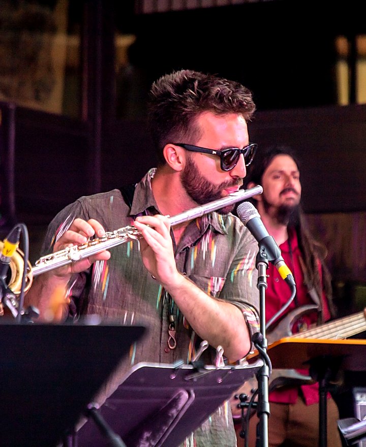 Jeff Fennell playing flute on stage at the Springfield Jazz & Roots Festival